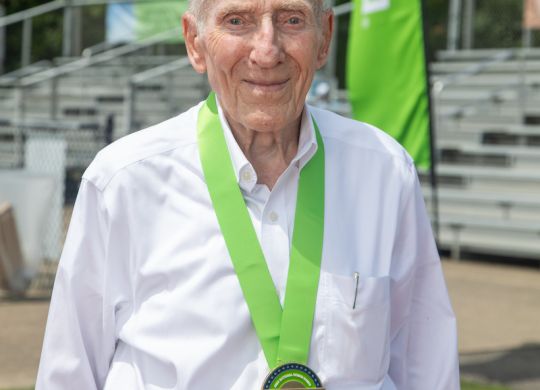 Runner Roy Englert, 100, accepted his Humana Game Changer medal at the 2023 National Senior Games on Sunday, July 9, in Pittsburgh. Englert, from Woodbridge, Virginia, is one of 28 athletes selected for national recognition as a Humana Game Changer, which celebrates athletes’ commitment to healthy aging and their encouragement, motivation and inspiration to people of all ages to get active. Nearly 12,000 men and women ages 50 and over are competing July 7-18 as part of the largest multi-sport event in the world for seniors. Englert has competed in every National Senior Games since they began in 1987.  (Andrew Rush/AP Images for Humana Inc.)